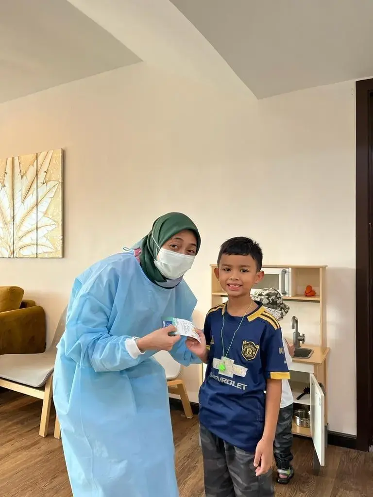 Happy patient at Mawarni Dental Clinic 9